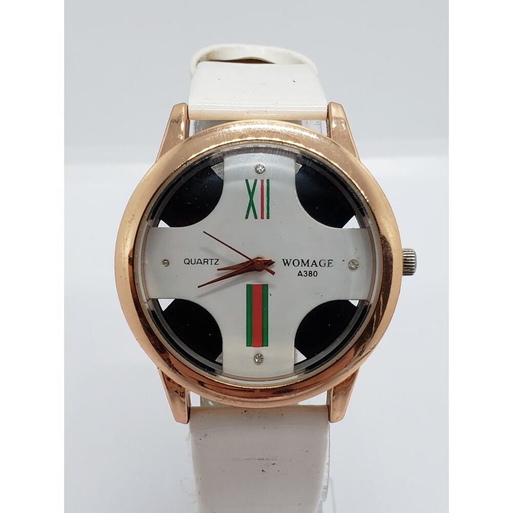 Womage A380 women's watch. Red and green accents on watch face. Working watch